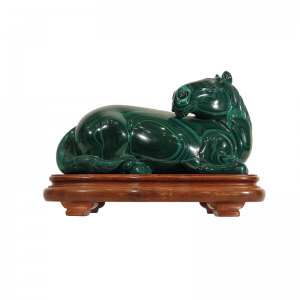 A carved malachite figure of crouching horse