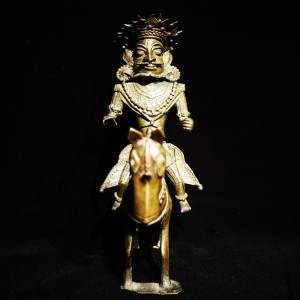 A Karnkata Bronze figure of a man riding a horse