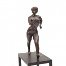 A JOGGING WOMAN FIGURING