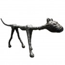 Wooden carving of a skinny cat