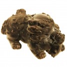 A bronze crouching fu dog