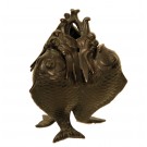 A japanese incense burner of three fish