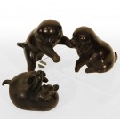 Japanese bronze casting of three puppies