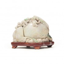 A PIECE OF JADE CARVED IN PEACH WITH MANY BOYS