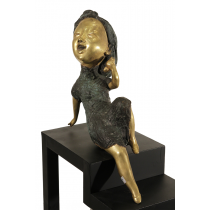 Gold gilt bronze of a lady talking on the phone 