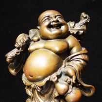 A Chinese bronze laughing Buddha