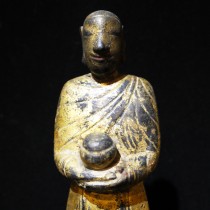 Burmese wooden standing monk