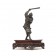 A Japanese bronze warrior wielding a long kanabo