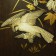 A JAPANESE MOTHER OF PEARL AND IVORY CARVING INLAY ON WOODEN PANEL