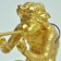 Gold gilted bronze of a boy blowing a flute