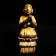 A wooden kneeling Burmese monk